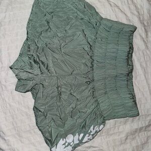 Green Scrunchy Workout Shorts with White Floral Detail